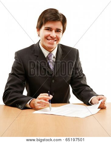 young business man on a desk, isolated on white