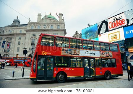 LONDON, UK - SEP 27: Piccadilly Circus street view on September 27, 2013 in London, UK. Built in 1819, it is the major shopping, entertainment areas and key tourist attractions in London.