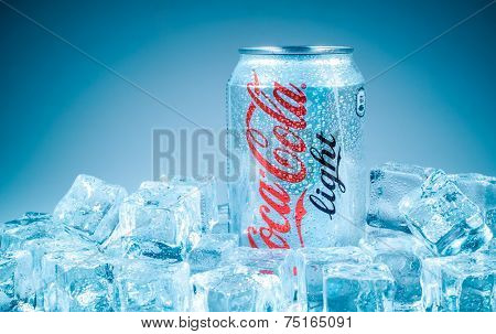 MOSCOW, RUSSIA-APRIL 4, 2014: Can of Coca-Cola Lignt on ice. Coca-Cola is a carbonated soft drink sold in stores, restaurants, and vending machines throughout the world.