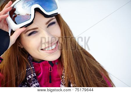 Portrait of woman in winter scenery
