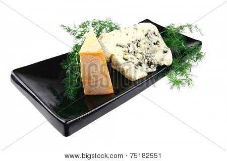 two soft delicatessen cheess on black porcelain plate