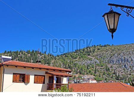 Stone Traditional House And Lantern In Kastoria City (Epirus, Greece)