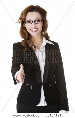 Happy successful businesswoman rady to hand shake.