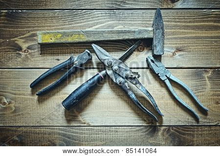 old tools on wooden background