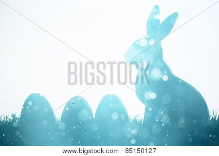 Easter bunny and eggs on meadow,Multi exposure.