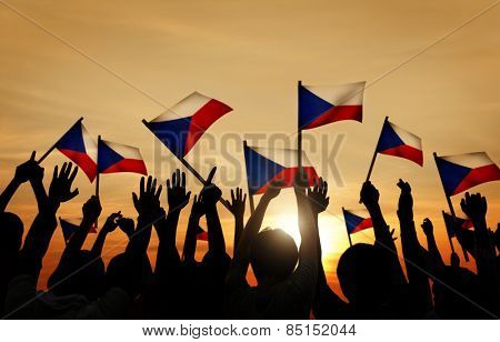 Silhouettes of People Holding the Flag of Philippines Concept