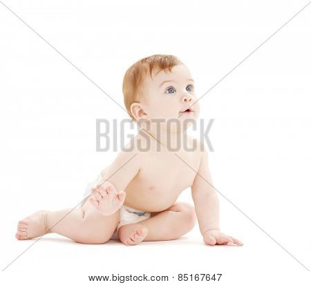bright picture of crawling curious baby over white backgroubd