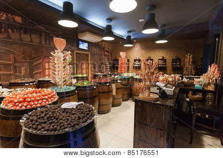 DUBROVNIK, CROATIA - MAY 28, 2014: Interior of the Candy shop Mateo with impressive range of treats, including chocolate, bonbons, and gummy bears all presented in pirate crates and barrels
