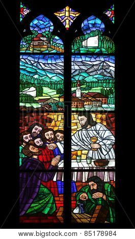 VIENNA, AUSTRIA - OCTOBER 10: Last supper, Stained glass in Votiv Kirche (The Votive Church). It is a neo-Gothic church located on the Ringstrabe in Vienna, Austria on October 10, 2014
