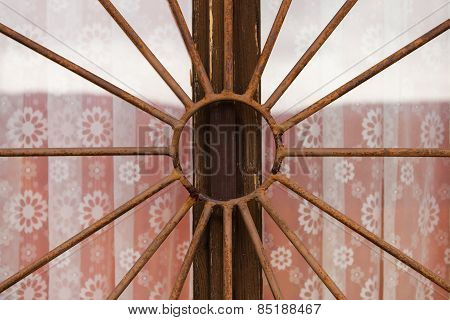 Rusty metal bars on a window