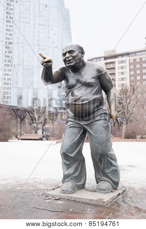 Moscow, Russia, March, 03, 2015: Monument Yevgeny Leonov in the role of associate professor at the Mosfilmovskaya street, Moscow