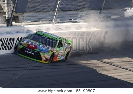 Las Vegas, NV - Mar 07, 2015:  David Ragan (18) hits the wall and damages his M&M's Toyota during the the Kobalt 400 at Las Vegas Motor Speedway in Las Vegas, NV.
