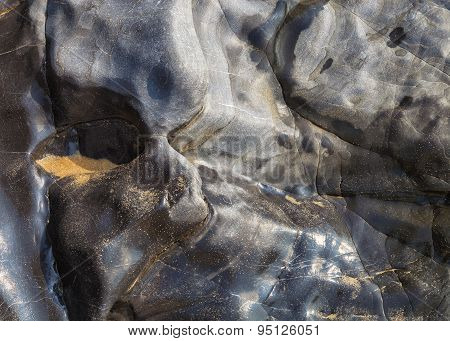 Abstract texture of a polished rock