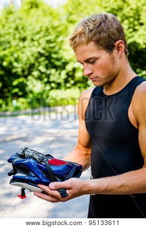 Professional cyclists wear a helmet for his safety