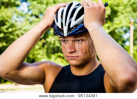 Professional cyclists wear a helmet for his safety