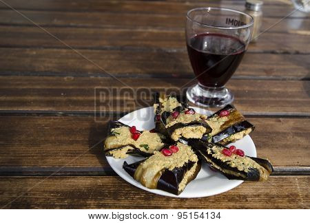 Eggplant phvali and a glass of wine. Georgian cuisine