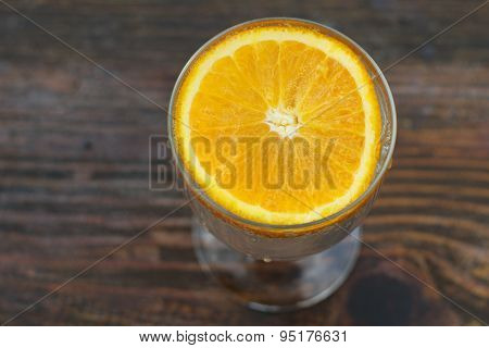 Orange in a glass of water