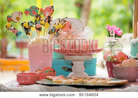 Prepared birthday table with sweets for children party
