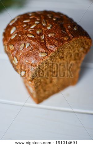 Rye bread with sunflower seeds. Black bread with flour coarse.