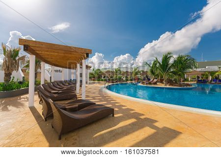 Cayo Guillermo island, Iberostar Playa Pilar hotel, Cuba, June 28, 2016, nice beautiful inviting view of a curved wide open comfortable swimming pool with people relaxing and enjoying their time