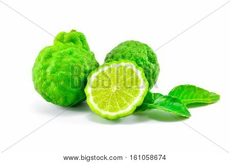 The green kaffir lime, half kaffir lime and leaf of kaffir lime on white background isolate.