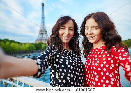 Beautiful Twin Sisters Taking Selfie