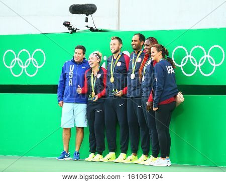 RIO DE JANEIRO, BRAZIL -AUGUST 14, 2016: Team USA mixed doubles tennis players and coaches after medal ceremony of the Rio 2016 Olympics