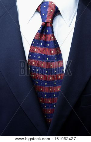 classic wool blue suit , tie knot, white shirt, cloceup, official wear detail,
