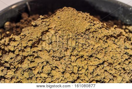 close up gold and brown coffee powder