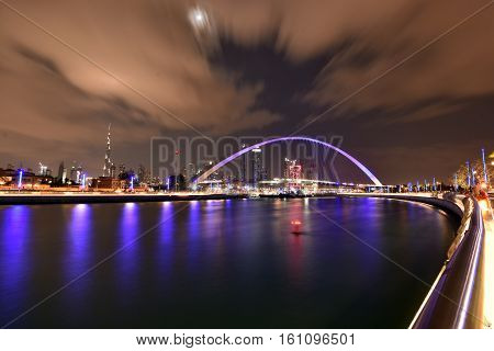 Dubai Skyline at night from new Dubai Canal, U.A.E