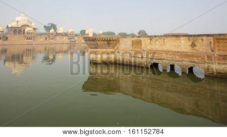 Kusum Sarovar Govardhan Mandir. This lake is one of the most visited places in Mathura. Next to it there are numerous temples and ashrams. Uttar Pradesh India.