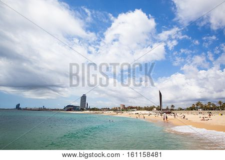 BARCELONA SPAIN - MAY 30 2016: BARCELONETA BEACH. 500000 VISITORS FROM EVERYWHERE VISIT THIS POPULAR BECH ON SUMMER SEASON. BARCELONA SPAIN.