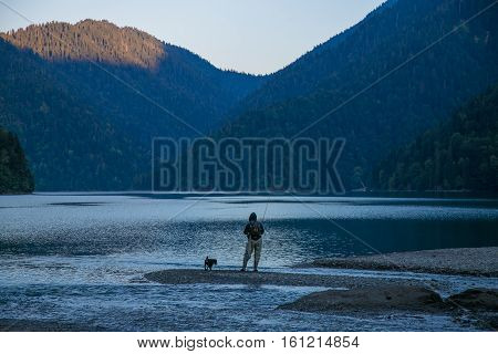 Trout fishing in the alpine lake Ritsa