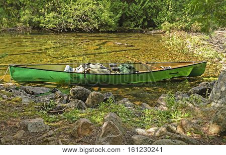 Canoe on a Remote Lake Shore on Agnes Lake in Quetico Provincial Park in Ontario