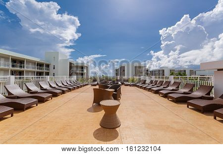 Cayo Guillermo island, Iberostar Playa Pilar hotel, Cuba, June 28, 2016, amazing gorgeous view of various modern stylish outdoor patio furniture with comfortable cozy sunbeds