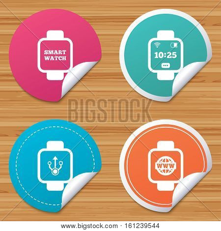 Round stickers or website banners. Smart watch icons. Wrist digital time watch symbols. USB data, Globe internet and wi-fi signs. Circle badges with bended corner. Vector
