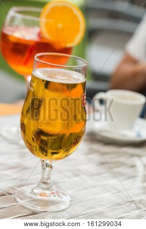 Traditional Spritz aperitif and beer in a bar in Italy