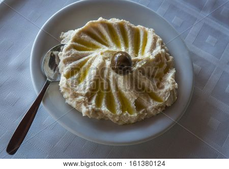 Taramasalata In White Platter With Olives