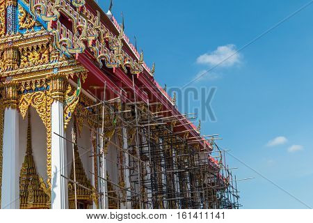 Temple Roof Vintage Thai Style With Against Blue Sky Background