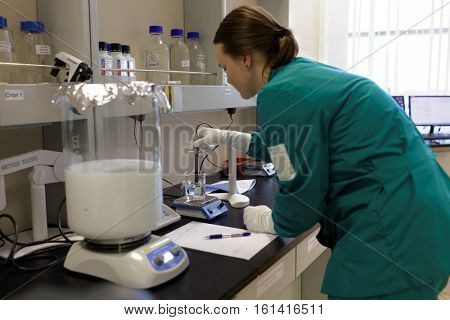 ST. PETERSBURG, RUSSIA - NOVEMBER 16, 2016: Researcher at work in the High-Throughput Biotechnology Laboratory of BIOCAD. It is one of the full-cycle drug development and manufacturing companies