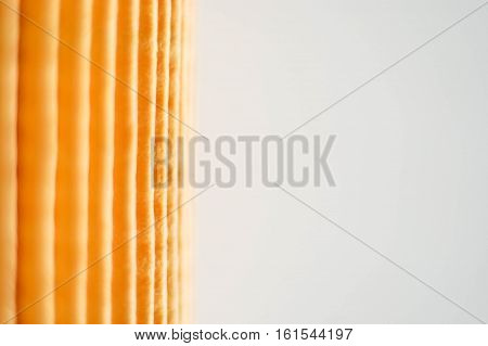 Yellow paper Oil filter texture on white background