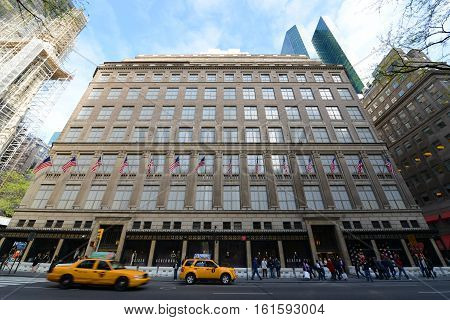 NEW YORK CITY - MAY 6, 2013: Saks Fifth Ave flagship store on Fifth Avenue east side between 49th and 50th Street in midtown Manhattan, New York City, USA.