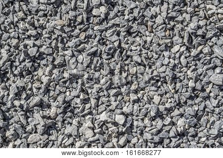 Crushed grey stone texture background Rock texture
