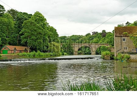 River Wear and Prebends Bridge a stone structure that spans the river in Durham North East England.