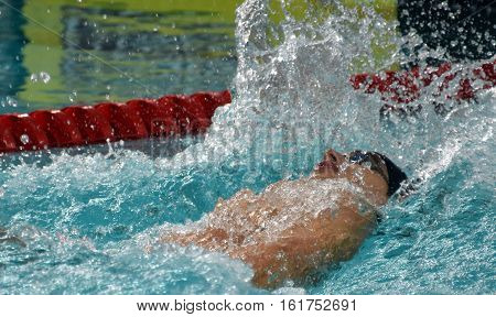 Hong Kong China - Oct 30 2016. Competitive swimmer SANKOVICH Pavel (BLR) swimming in the Men's Backstroke 50m Preliminary Heat. FINA Swimming World Cup Victoria Park.