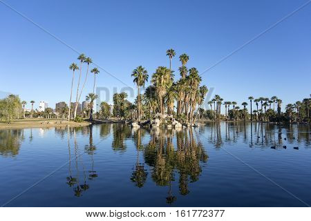 Bright blue winter sky on the lake in Encanto park located right in downtown of Phoenix Arizona; Copyspace