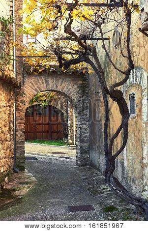 Charming narrow street of Venasque. Venasque one of the most beautiful village of France.