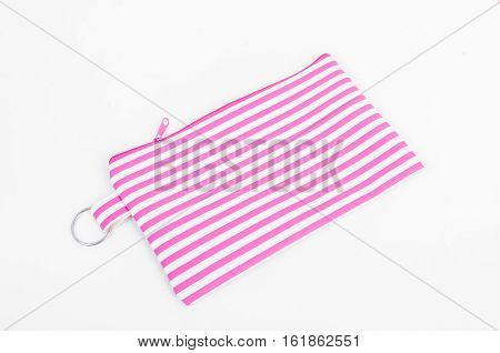 Make up pink bag on white background