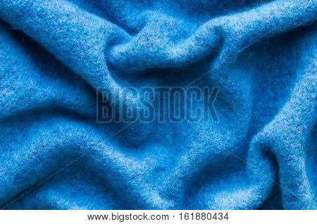 Close Up Of Blue Crumpled Woolen Cloth. Top View. Woolen Cloth.