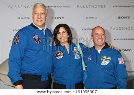 LOS ANGELES - DEC 14:  Mike Massimino, Nicole Stott, Garrett Reismanl at the 